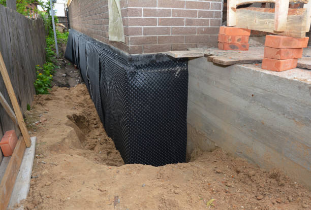 SJ Waterproofing Pros technician performing targeted Vapor Barrier Installation assessment in Guntersville, AL